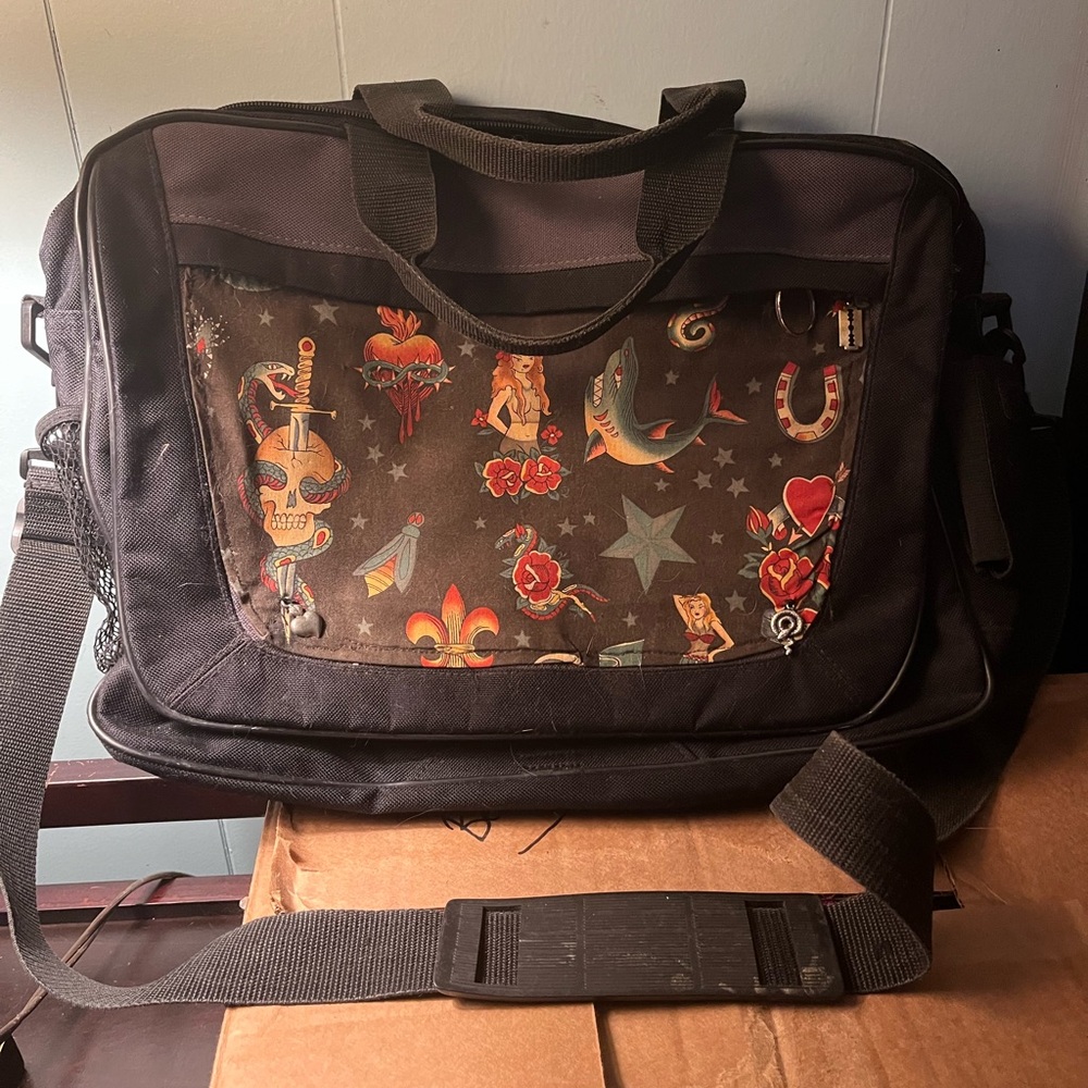 Modified tattoo style cross body messenger bag